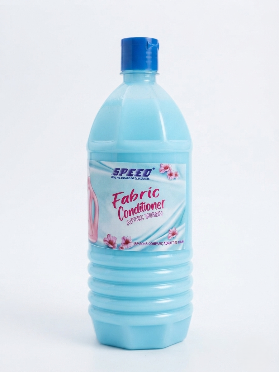 A bottle of SPEED Fabric Conditioner in light blue, featuring a blue flip-top cap and a white label with pink floral accents, set against a plain white background.